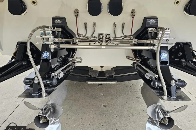 Slide: The Image of Close-up of 2004 Black Thunder 460 boat's dual propeller system and mechanical components. - 28