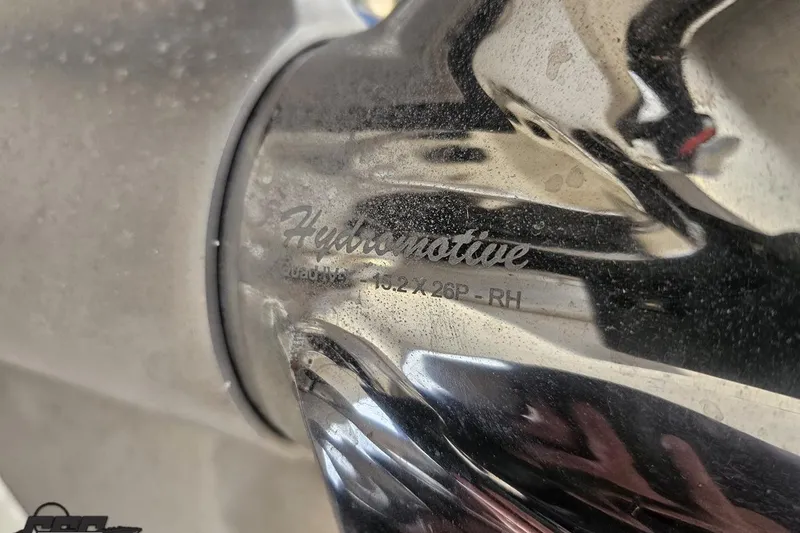 Slide: The Image of Close-up of a 2004 Black Thunder 460 boat propeller with HydroMotive branding. - 29