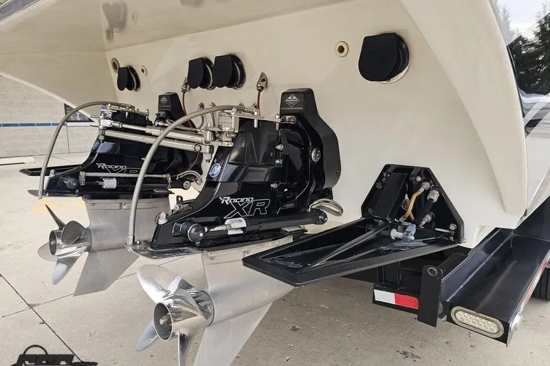 Slide: The Image of Rear view of 2004 Black Thunder 460 boat with dual Racing XR outdrives. - 30