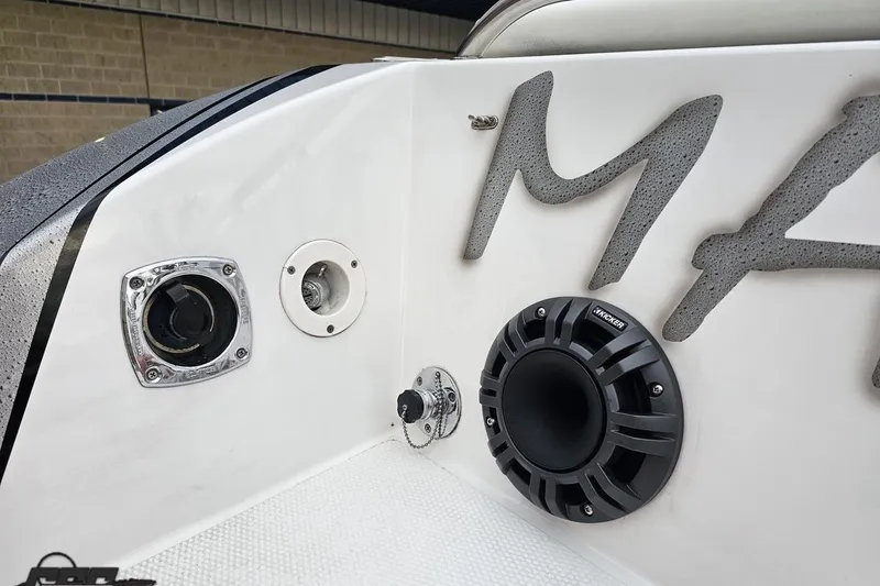 Slide: The Image of 2004 Black Thunder 460 boat with speaker and control panel detail. - 35