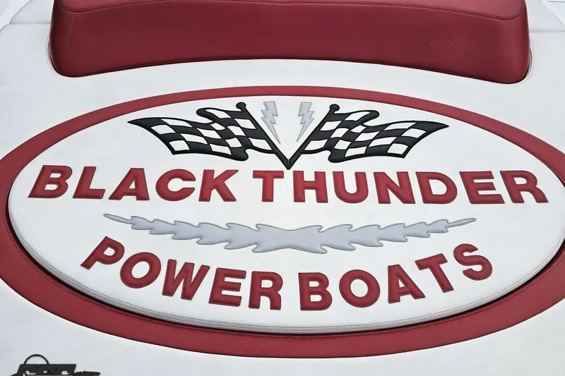 Slide: The Image of Logo of Black Thunder Power Boats with checkered flags and lightning bolt. - 39