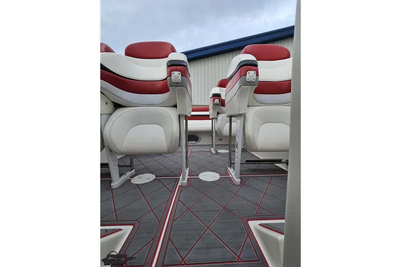 Slide: The Image of Luxury seating on 2004 Black Thunder 460 boat with red and white upholstery. - 93