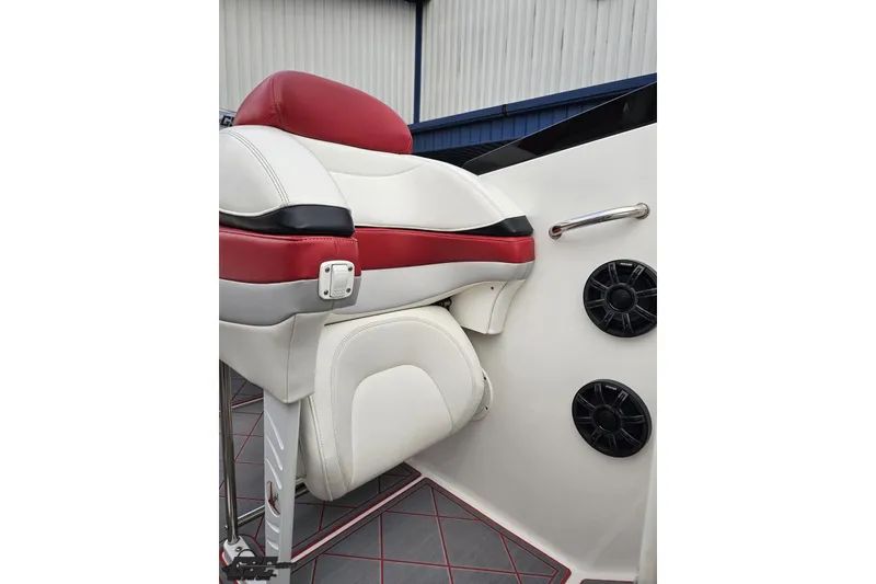Slide: The Image of Red and white seat in 2004 Black Thunder 460 boat interior. - 95