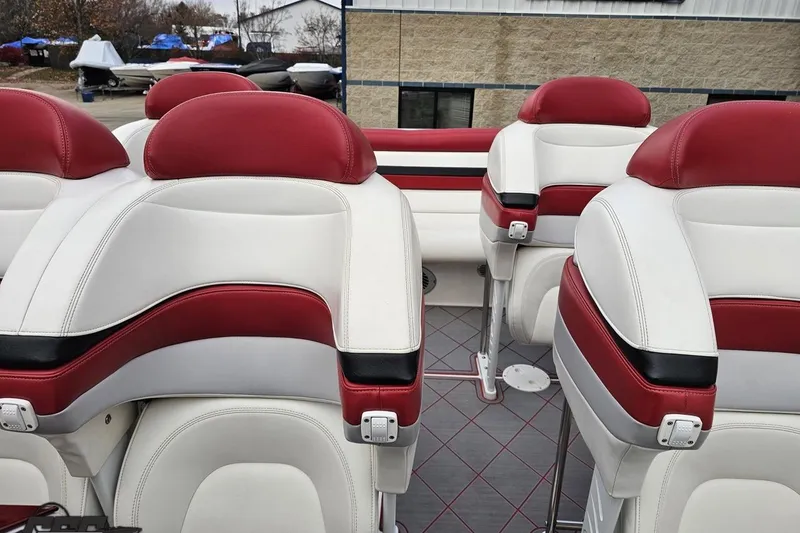 Slide: The Image of 2004 Black Thunder 460 boat interior with red and white leather seats. - 99