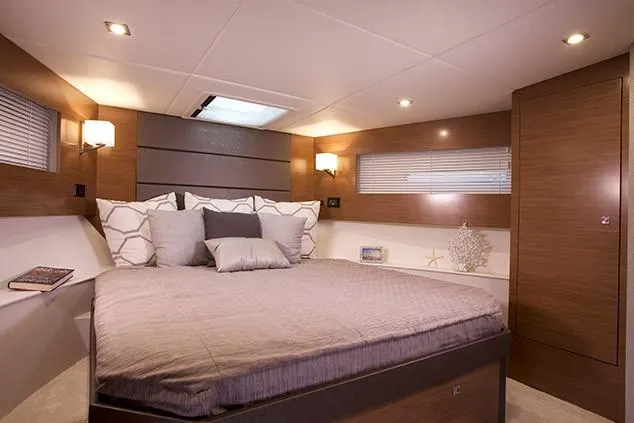 Slide: The Image of Interior view of 2019 Cruisers Yachts 42 Cantius helm with modern controls and windshield. - 10