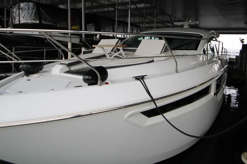 Slide: The Image of 2019 Cruisers Yachts 42 Cantius docked, showcasing sleek design and modern features. - 106