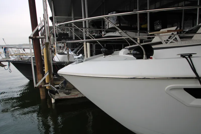 Slide: The Image of 2019 Cruisers Yachts 42 Cantius docked at marina, side view. - 107