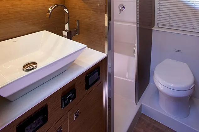 Slide: The Image of Manufacturer Provided Image: Modern bathroom in 2019 Cruisers Yachts 42 Cantius with sink, faucet, and toilet. - 121