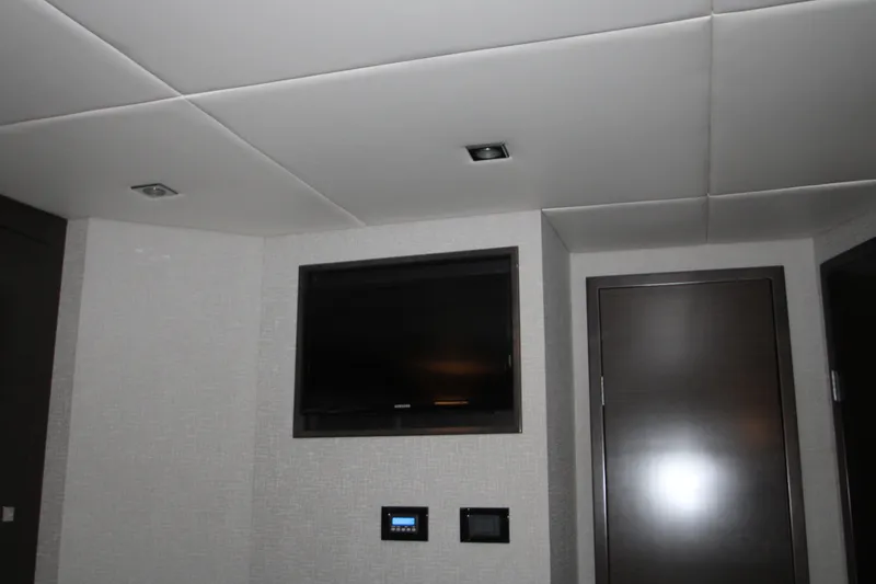 Slide: The Image of Interior of 2019 Cruisers Yachts 42 Cantius with TV and control panel. - 16