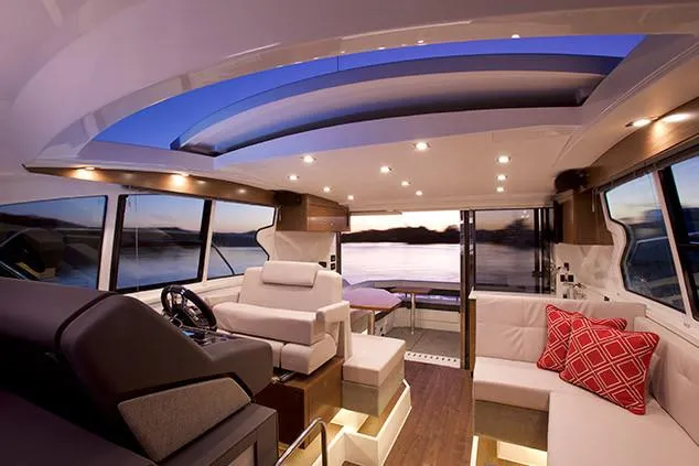 Slide: The Image of Luxurious interior of 2019 Cruisers Yachts 42 Cantius with elegant seating and modern decor. - 7