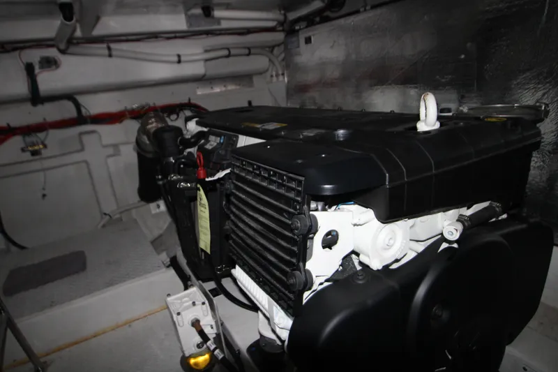 Slide: The Image of Engine room of 2019 Cruisers Yachts 42 Cantius, showcasing mechanical components. - 99