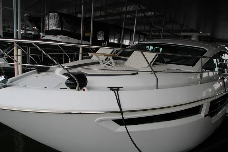 Slide: The Image of 2019 Cruisers Yachts 42 Cantius docked, featuring sleek design and modern amenities. - 108