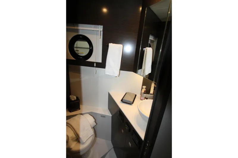 Slide: The Image of Luxurious bathroom in 2019 Cruisers Yachts 42 Cantius with modern fixtures and elegant design. - 27