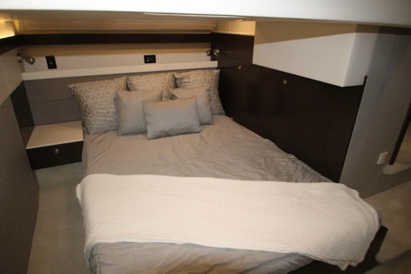 Slide: The Image of Luxurious bedroom interior of 2019 Cruisers Yachts 42 Cantius with elegant bedding. - 36