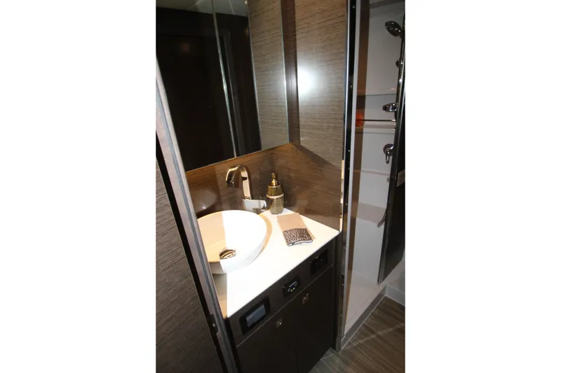 Slide: The Image of Luxurious bathroom in 2019 Cruisers Yachts 42 Cantius with modern fixtures and elegant design. - 41