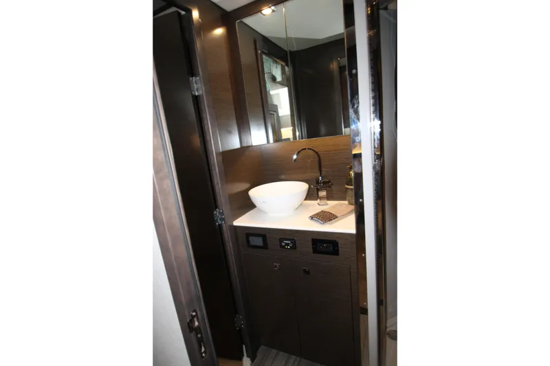Slide: The Image of Luxurious bathroom interior of 2019 Cruisers Yachts 42 Cantius with modern sink and fixtures. - 45
