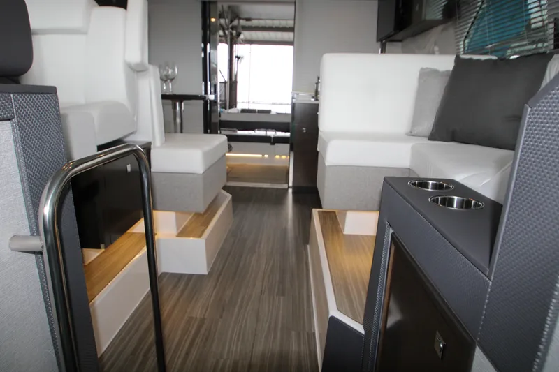Slide: The Image of Interior of 2019 Cruisers Yachts 42 Cantius, featuring modern seating and sleek design. - 48