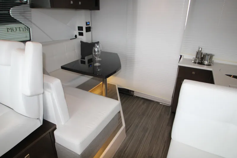 Slide: The Image of Luxurious interior of 2019 Cruisers Yachts 42 Cantius with modern seating and dining area. - 55