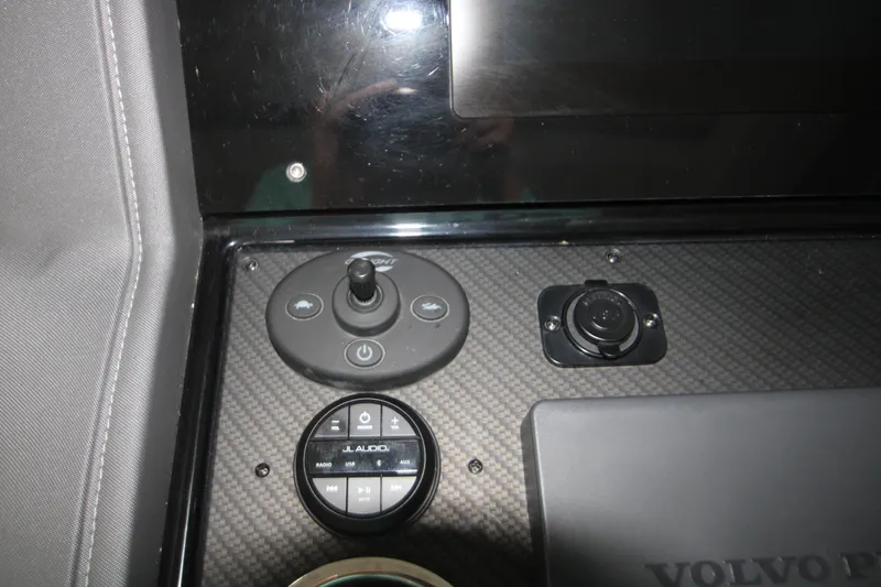 Slide: The Image of Control panel of 2019 Cruisers Yachts 42 Cantius with audio and power controls. - 64