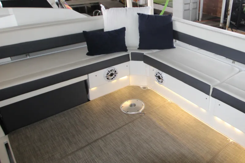 Slide: The Image of 2019 Cruisers Yachts 42 Cantius interior with cushioned seating and ambient lighting. - 74