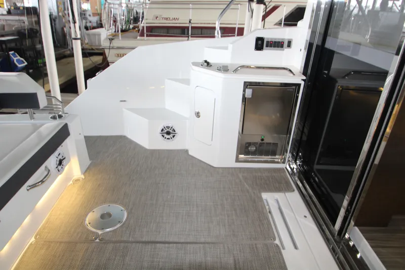Slide: The Image of 2019 Cruisers Yachts 42 Cantius cockpit with modern amenities and sleek design. - 87