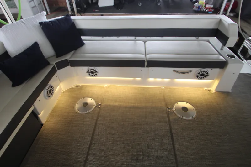 Slide: The Image of Luxurious seating area on 2019 Cruisers Yachts 42 Cantius with ambient lighting. - 89
