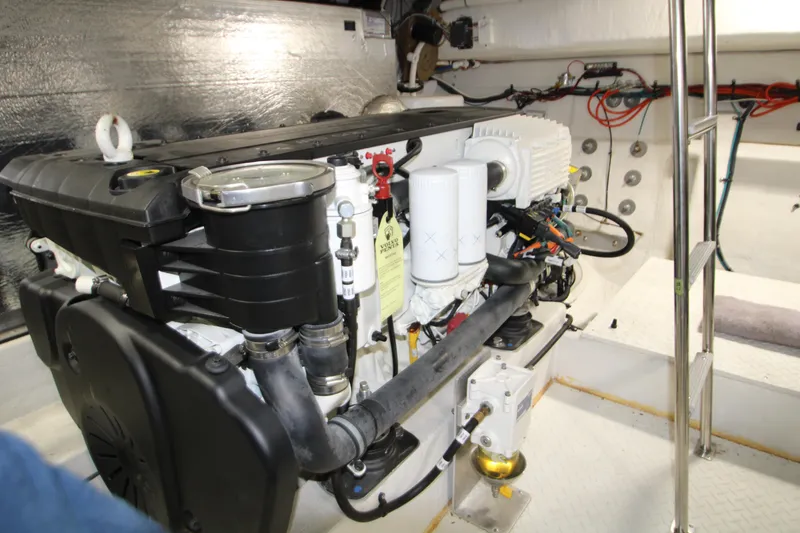 Slide: The Image of Engine room of 2019 Cruisers Yachts 42 Cantius, featuring a Volvo Penta engine. - 91