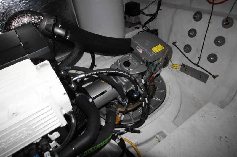Slide: The Image of Engine room of 2019 Cruisers Yachts 42 Cantius with visible mechanical components. - 97