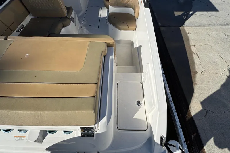 Slide: The Image of 2022 Bayliner VR6 Bowrider OB docked, featuring spacious seating and sleek design. - 14