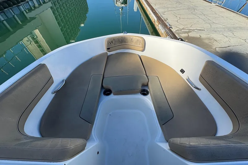 Slide: The Image of Control panel of 2022 Bayliner VR6 Bowrider OB with switches and cup holder. - 38