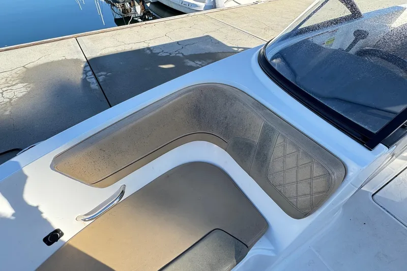 Slide: The Image of Storage compartment with life jackets in 2022 Bayliner VR6 Bowrider OB boat. - 43