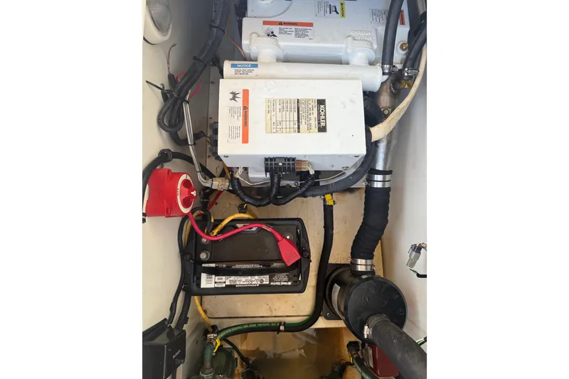 Slide: The Image of 2006 Hydra-Sports Vector 2900 VX boat interior with cushioned seating and steering console. - 8