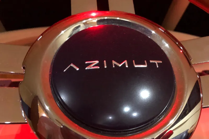 Slide: The Image of Close-up of Azimut 62 Evolution 2007 steering wheel emblem. - 10