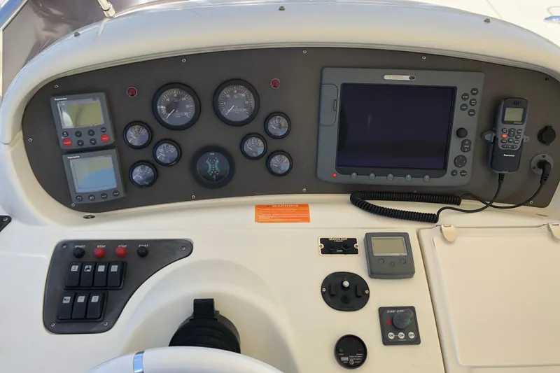 Slide: The Image of Control panel of a 2007 Azimut 62 Evolution yacht with navigation instruments. - 31