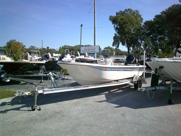 Slide: The Image of 2022 Carolina Skiff JLS 178 boat on trailer in outdoor dealership lot. - 8