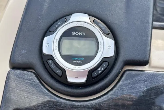 Slide: The Image of Sony marine audio control on 2015 Bennington 2350 QCL boat dashboard. - 16