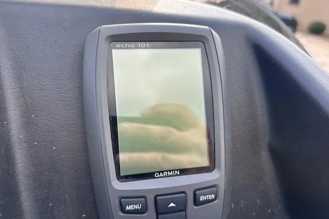 Slide: The Image of Garmin Echo 101 fishfinder on 2015 Bennington 2350 QCL boat dashboard. - 19