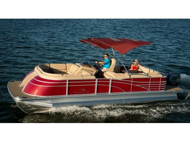 Slide: The Image of Manufacturer Provided Image: 2015 Bennington 2350 QCL pontoon boat cruising on water with passengers. - 2