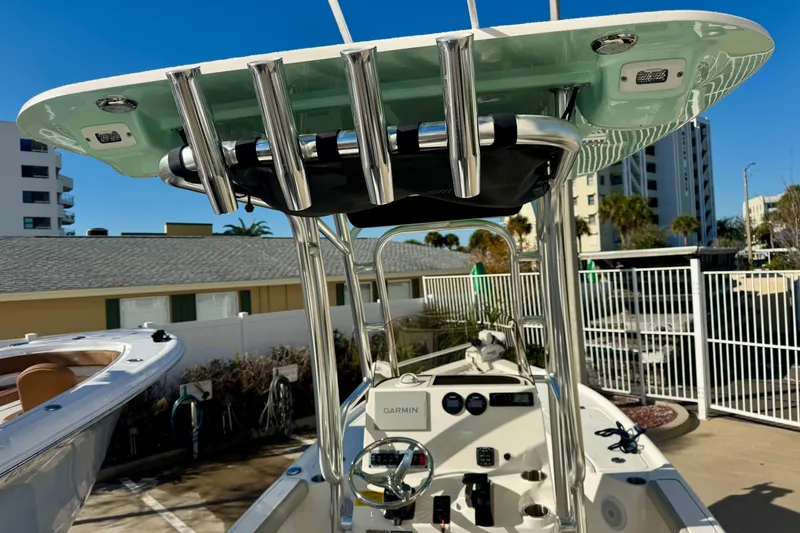 Slide: The Image of 2023 Key West 210 Bay Reef boat with T-top and Garmin electronics. - 24