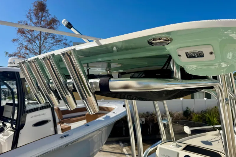 Slide: The Image of 2023 Key West 210 Bay Reef boat with rod holders and T-top detail. - 27