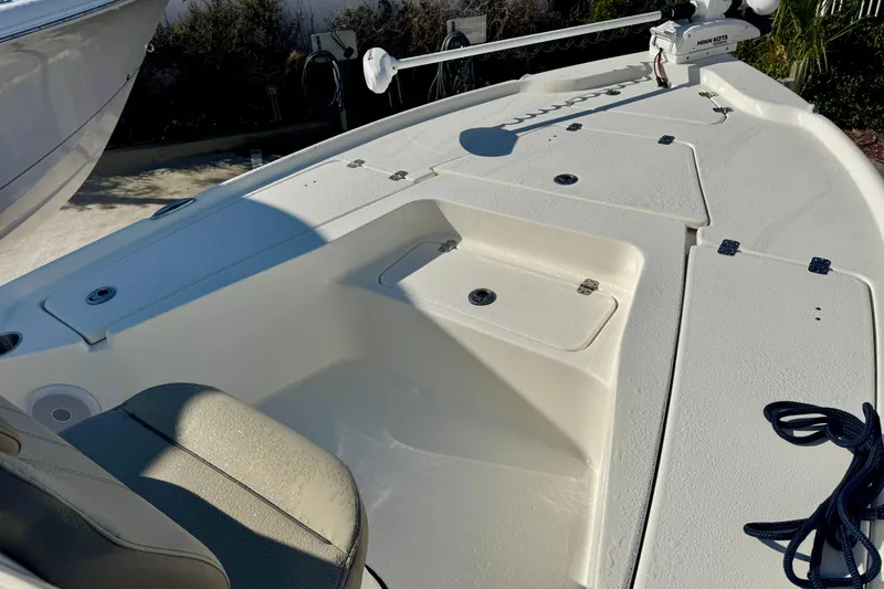 Slide: The Image of 2023 Key West 210 Bay Reef boat deck with storage compartments and seating. - 34