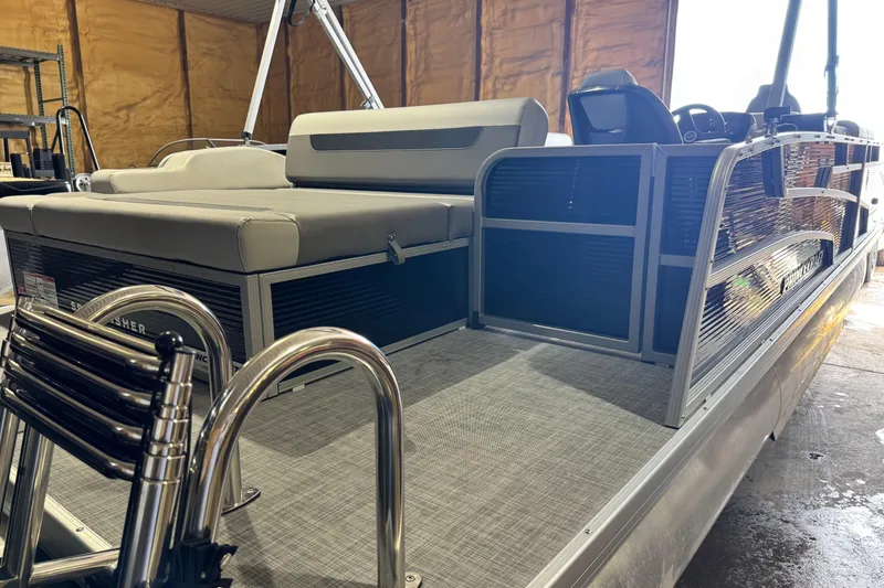 Slide: The Image of 2026 Princecraft Sportfisher 23-2S RL pontoon boat with sleek seating and modern design. - 13