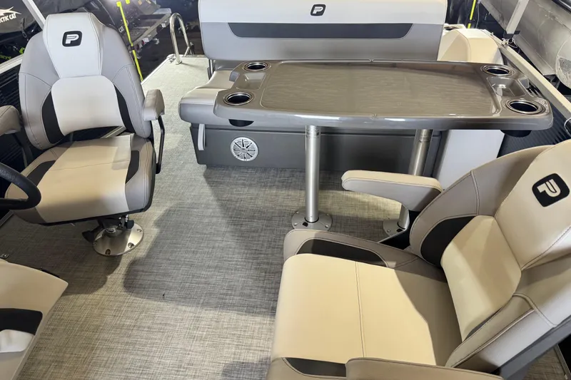 Slide: The Image of Interior of 2026 Princecraft Sportfisher 23-2S RL boat with seating and table. - 4
