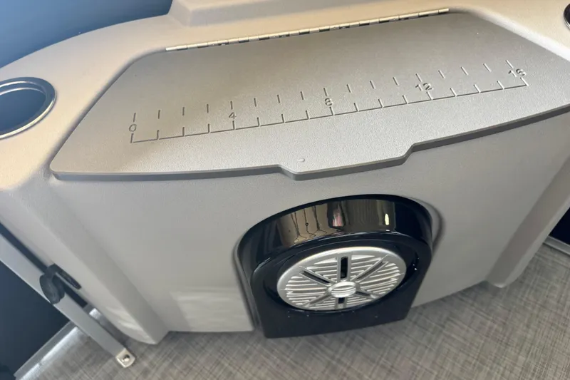 Slide: The Image of Control panel of 2026 Princecraft Sportfisher 23-2S RL boat with speaker and measurement scale. - 8