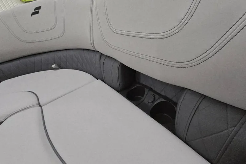 Slide: The Image of 2024 Starcraft SLS 3 boat interior with gray seating and cup holders. - 3