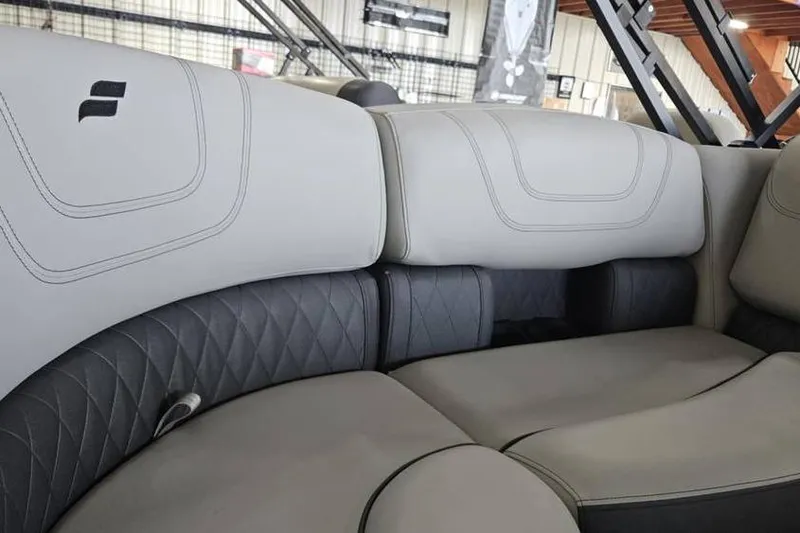 Slide: The Image of 2024 Starcraft SLS 3 boat interior with luxurious gray seating and stylish stitching. - 5
