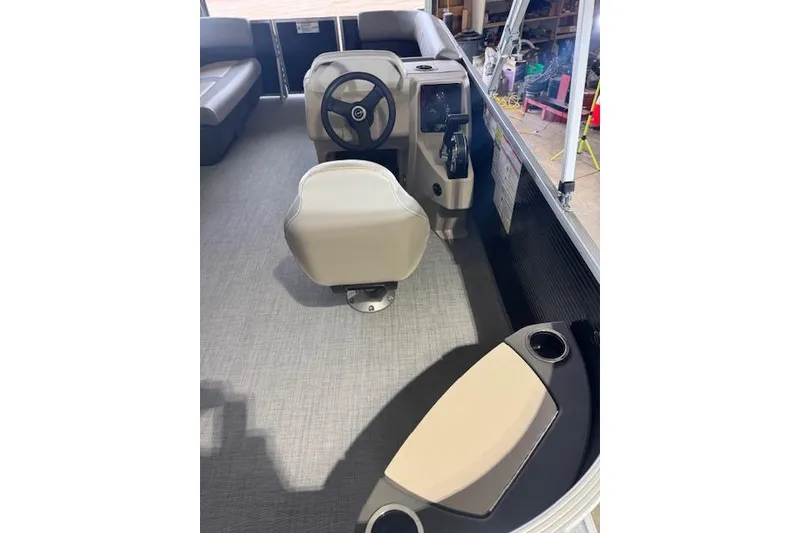 Slide: The Image of Interior view of 2026 Princecraft Jazz 170 boat, featuring steering console and seating. - 7