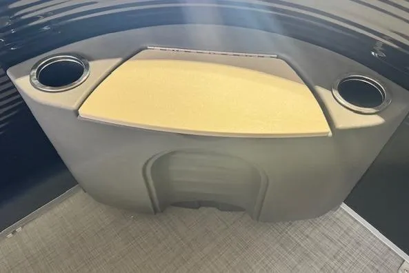 Slide: The Image of Interior of 2026 Princecraft Jazz 170 boat with cup holders and storage compartment. - 8