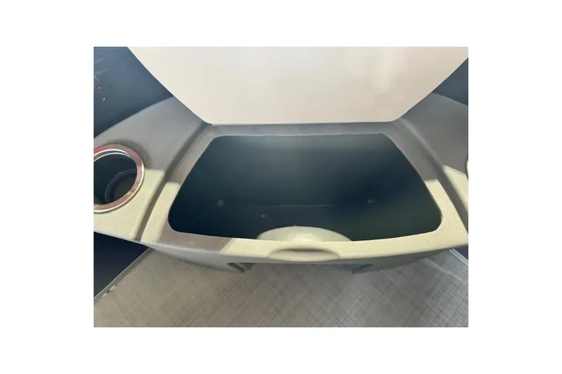 Slide: The Image of Storage compartment of 2026 Princecraft Jazz 170 boat with cup holder. - 9