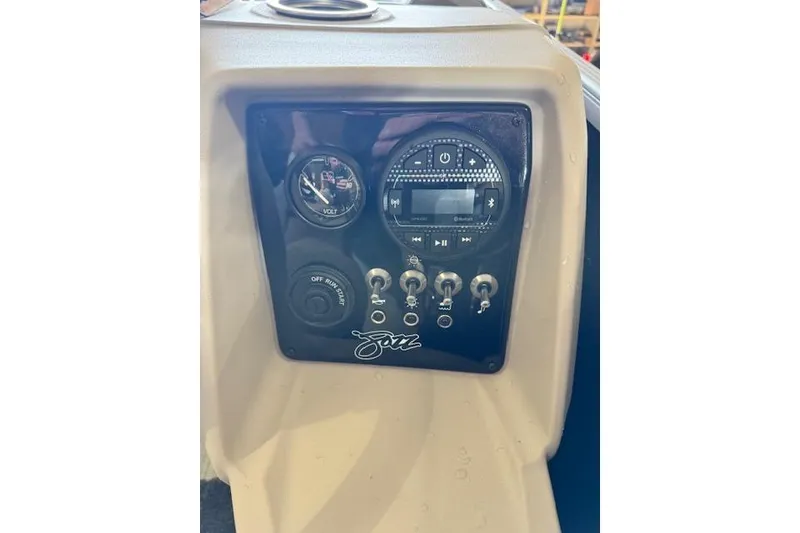 Slide: The Image of Control panel of 2026 Princecraft Jazz 190-4S boat with gauges and switches. - 6